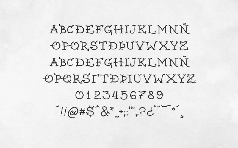8. "Tattoo Sailor" font by Woodcutter - wide 3